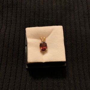 Vintage 14k gold pendant with amber color stone